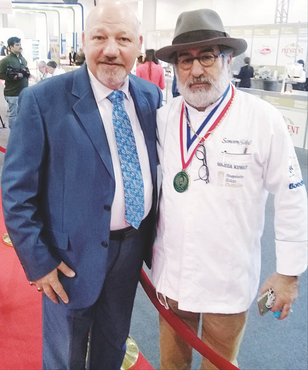 خالد فوزي ورئيس الطهاة سمعان هلال