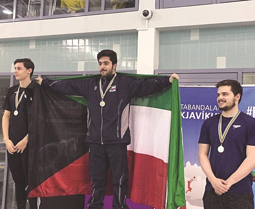 ... وعلي أشكناني بطل ذهبية 200 متر فراشة