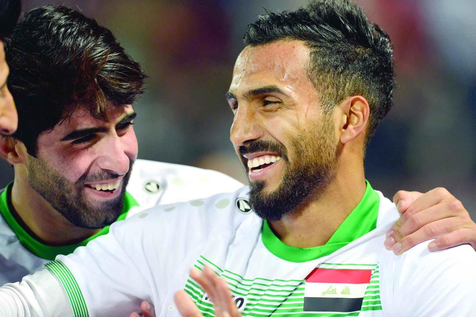 العراقي على حصني محتفلاً بالهدف الأول