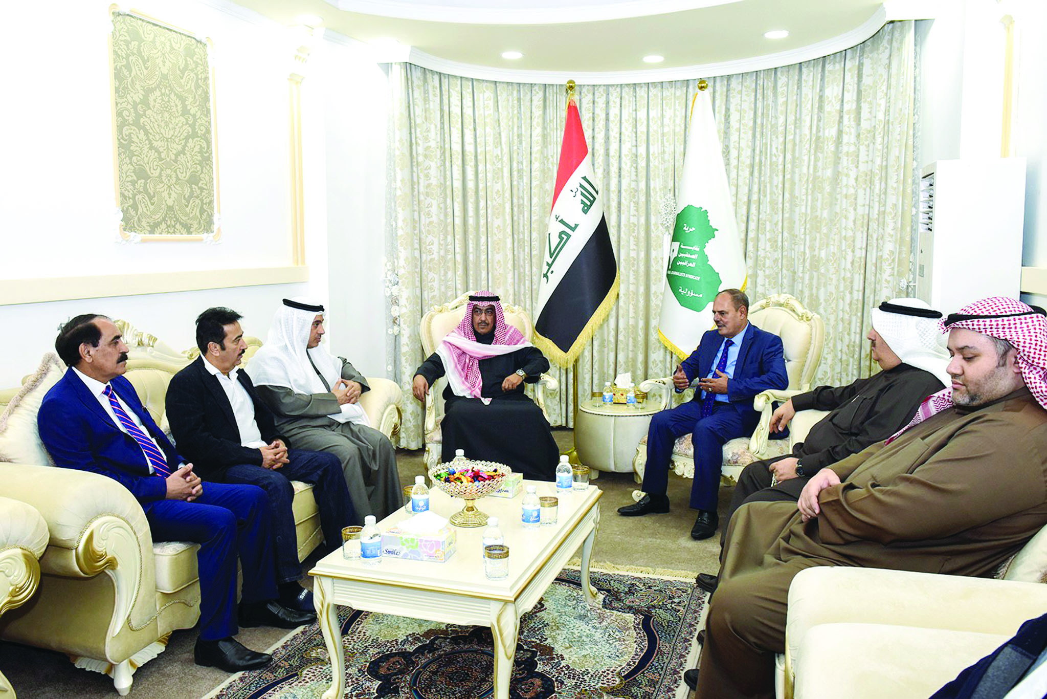 الوفد الإعلامي خلال زيارته لنقابة الصحافيين العراقيين