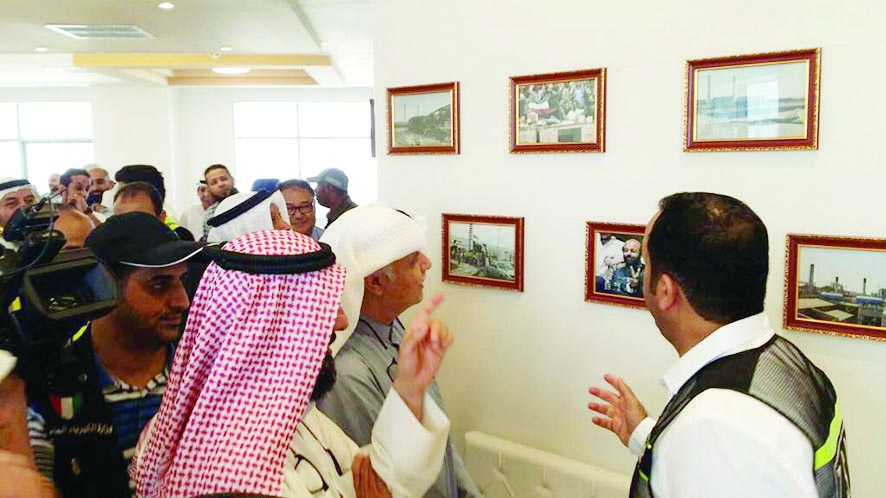 معرض لصور الدمار التي لحقت بمحطات القوى أثناء الغزو العراقي 