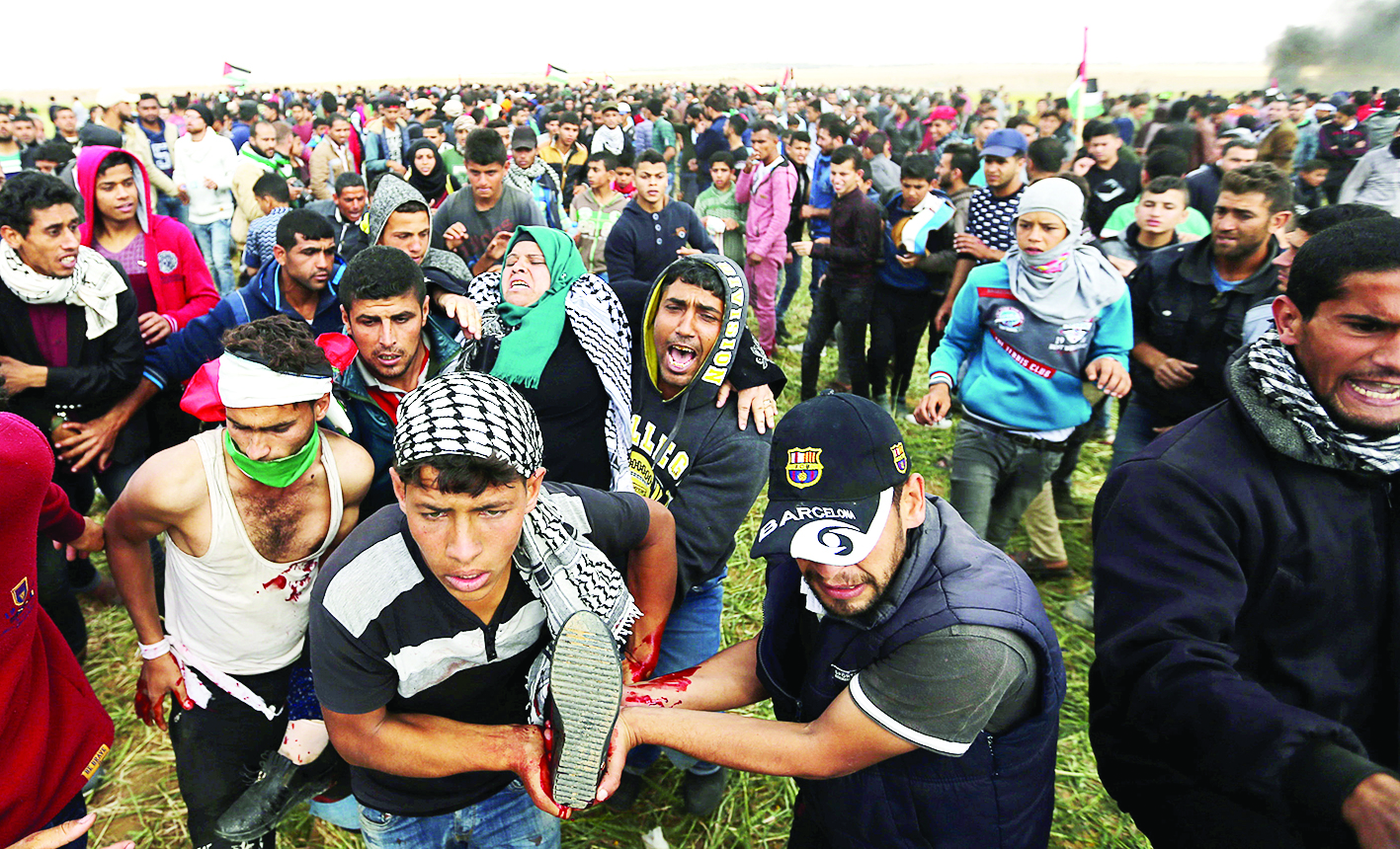 u0634u0628u0627u0646 u0641u0644u0633u0637u064au0646u064au0648u0646 u064au062du0645u0644u0648u0646 u0627u0645u0631u0623u0629 u0623u0635u064au0628u062a u0628u0631u0635u0627u0635 u0625u0633u0631u0627u0626u064au0644u064a u0639u0644u0649 u062du062fu0648u062f u063au0632u0629ttt (u0631u0648u064au062au0631u0632)