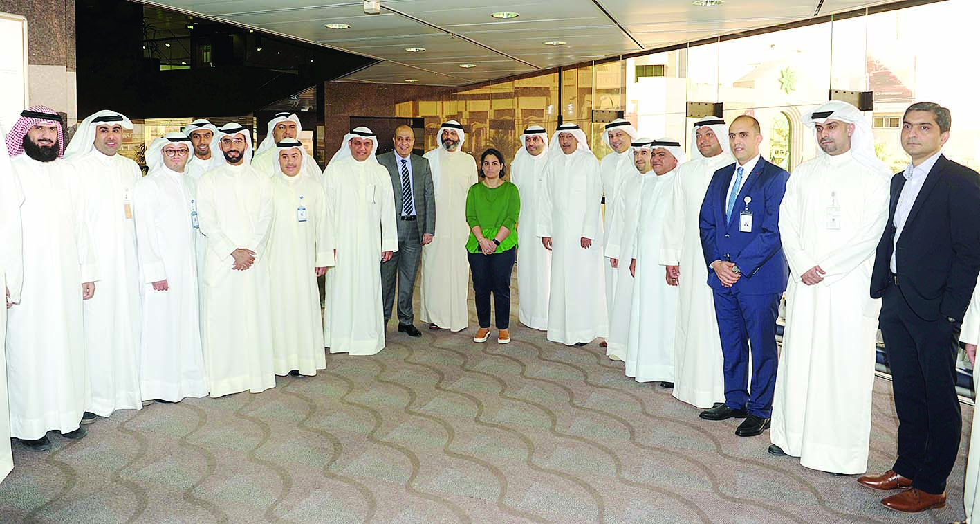 لقطة جماعية لمسؤولي «الهيئة» و«البورصة» و«المقاصة» 	(تصوير طارق عزالدين)