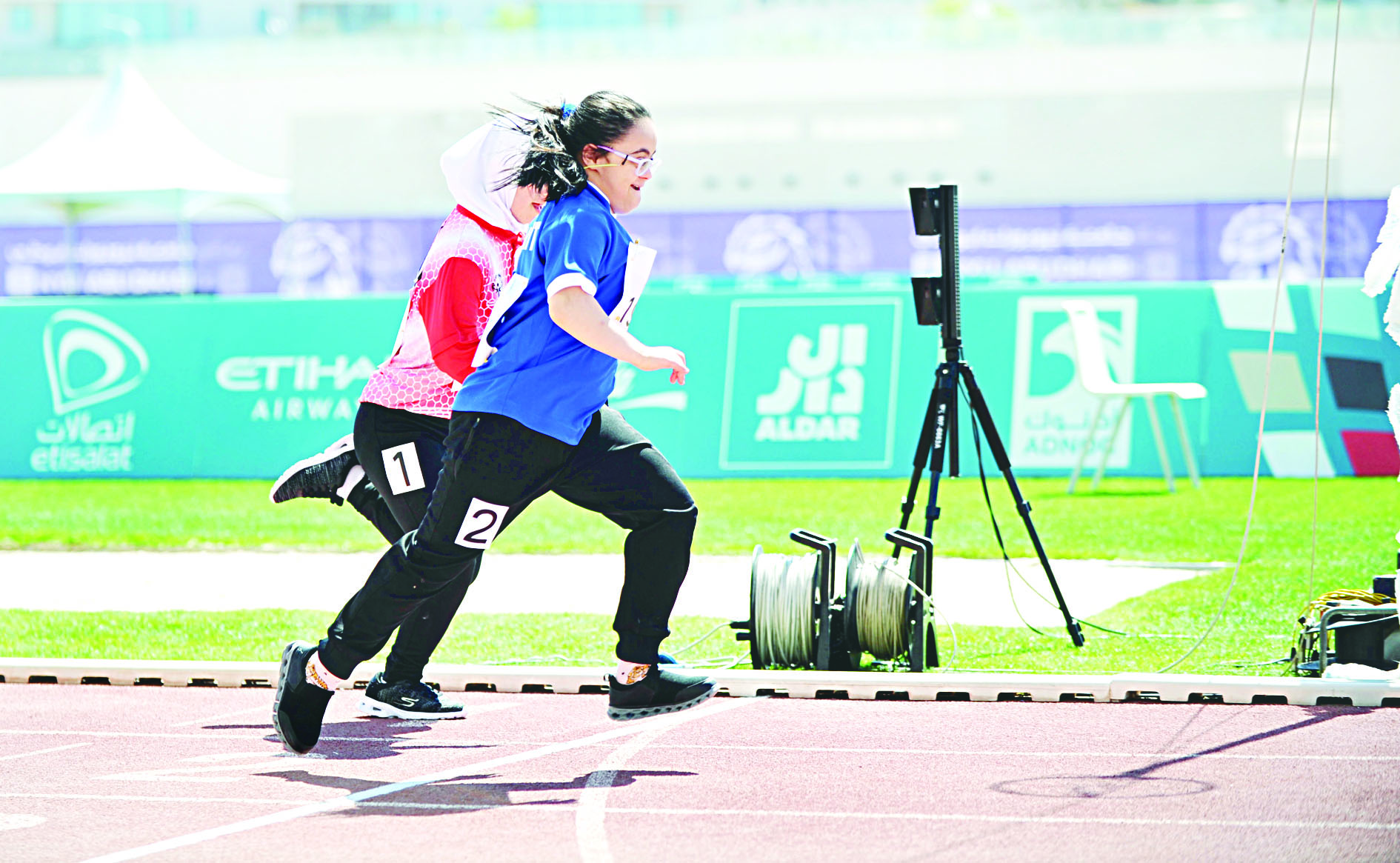 لاعبة كويتية في مسابقة الجري
