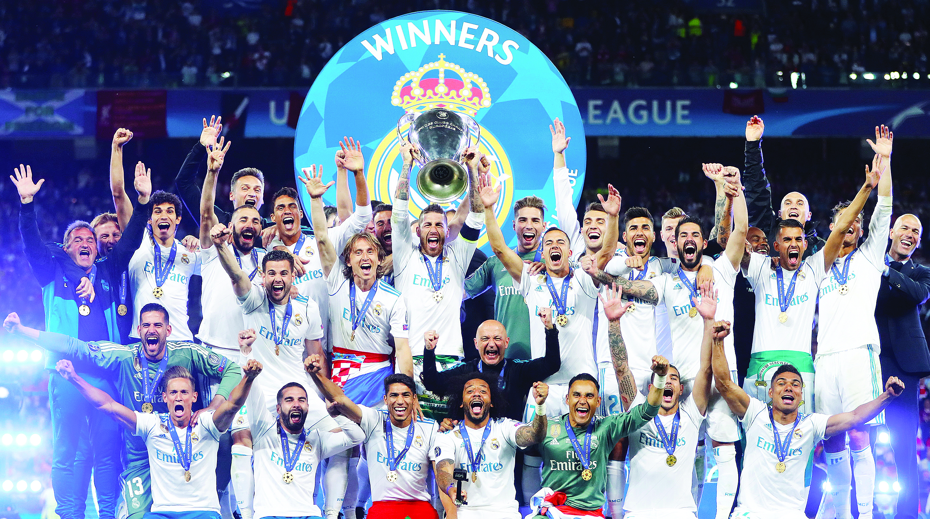 لاعبو ريال مدريد متوّجين باللقب الثالث على التوالي   	 (رويترز)