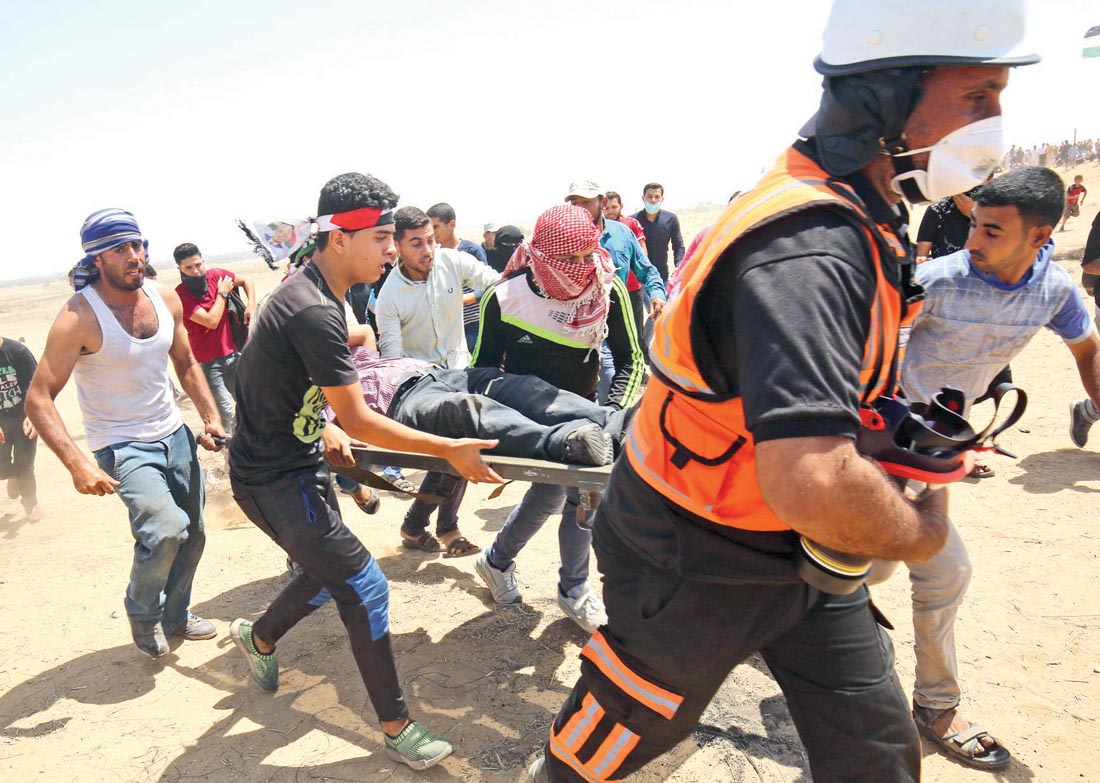 u0641u0644u0633u0637u064au0646u064au0648u0646 u064au062du0645u0644u0648u0646 u0645u0635u0627u0628u0627u064b u0641u064a u062cu0645u0639u0629 u00abu0645u0644u064au0648u0646u064au0629 u0627u0644u0642u062fu0633u00bb u062cu0646u0648u0628 u063au0632u0629t ( u0623 u0641 u0628)