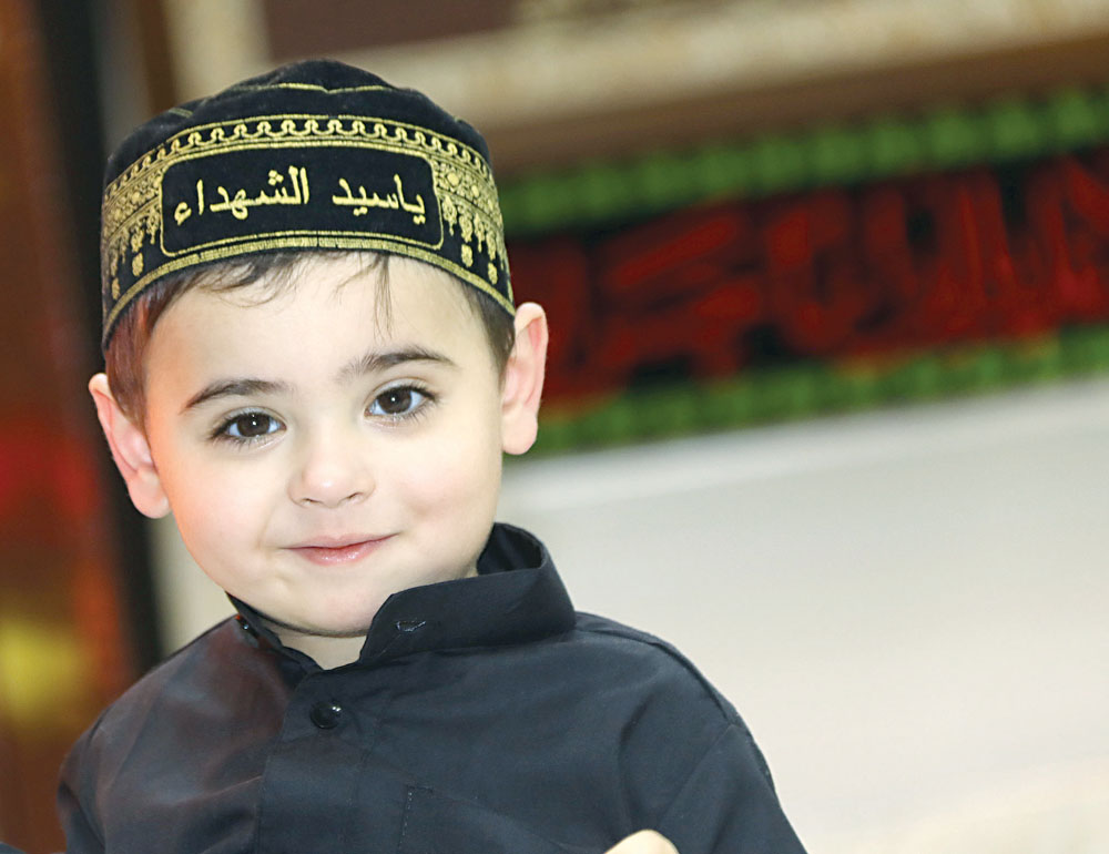 طفل في الحسينية الكربلائية