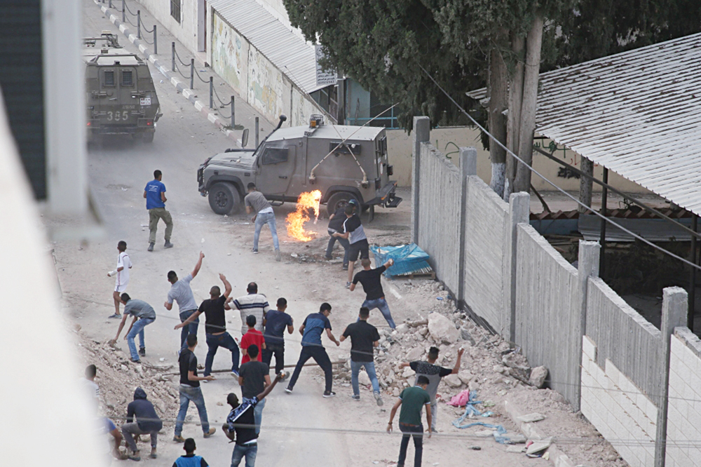 u0645u062du062au062cu0648u0646 u0641u0644u0633u0637u064au0646u064au0648u0646 u064au0631u0634u0642u0648u0646 u062fu0648u0631u064au0629 u0625u0633u0631u0627u0626u064au0644u064au0629 u0628u0627u0644u062du062cu0627u0631u0629 u0648u0627u0644u0645u0648u0644u0648u062au0648u0641 u0641u064a u0642u0631u064au0629 u0634u0648u064au0643u0629 u062du064au062b u064au0642u064au0645 u0645u0646u0641u0630 u0639u0645u0644u064au0629 u00abu0628u0631u0643u0627u0646u00bb   t          (u0623 u0641 u0628)