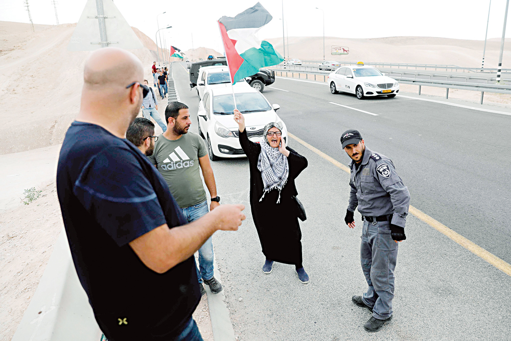 u0641u0644u0633u0637u064au0646u064au0629 u062au0634u0627u0631u0643 u0641u064a u062au0638u0627u0647u0631u0629 u0642u0631u0628 u0642u0631u064au0629 u0627u0644u062eu0627u0646 u0627u0644u0623u062du0645u0631t (u0623 u0641 u0628)