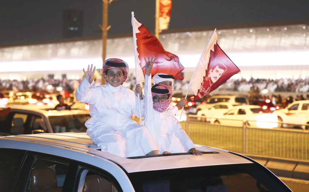 جانب من الاحتفالات التي شهدتها الدوحة أمس           	         (أ ف ب)