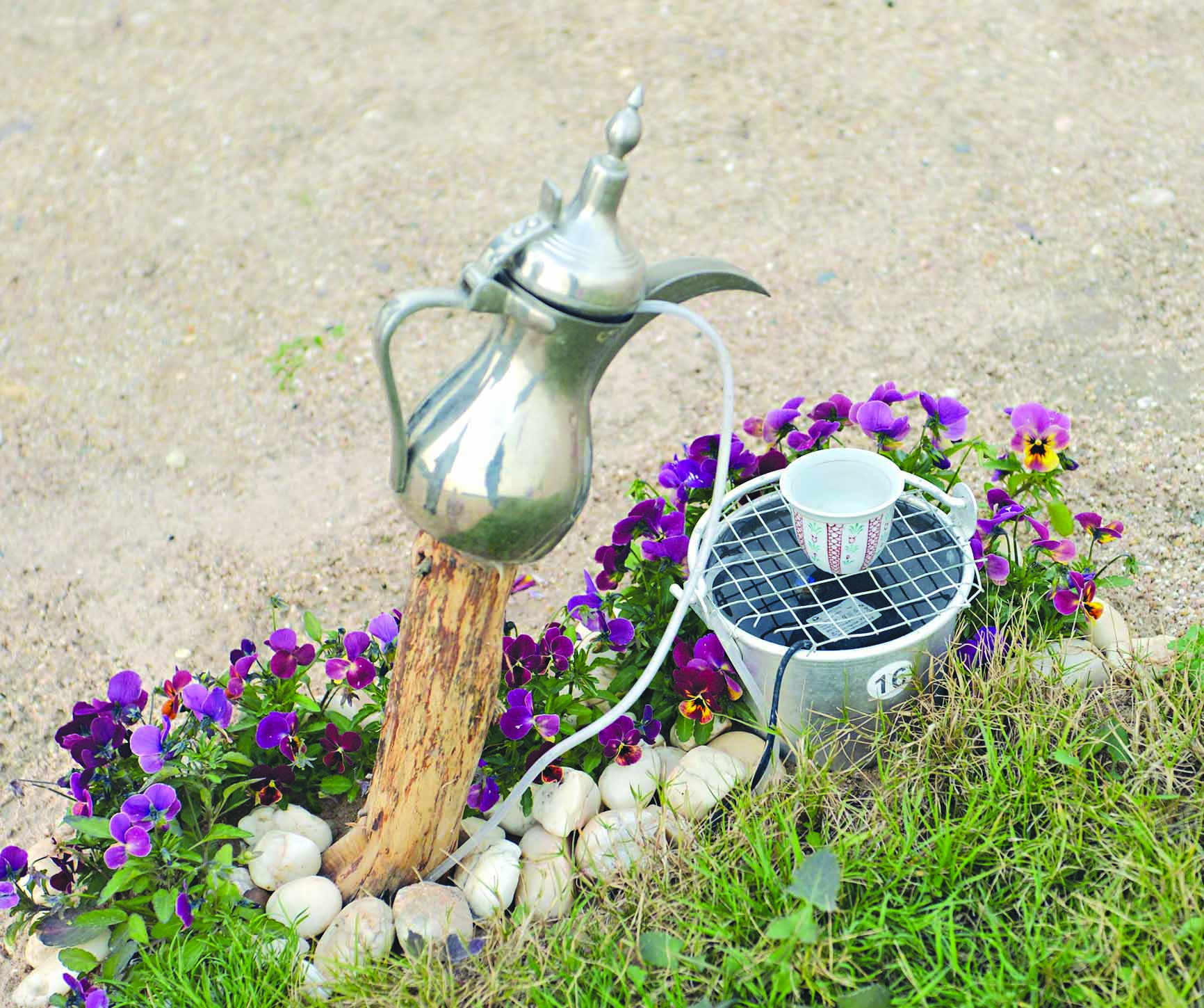 تصميم نافورة من دلة وفنجان