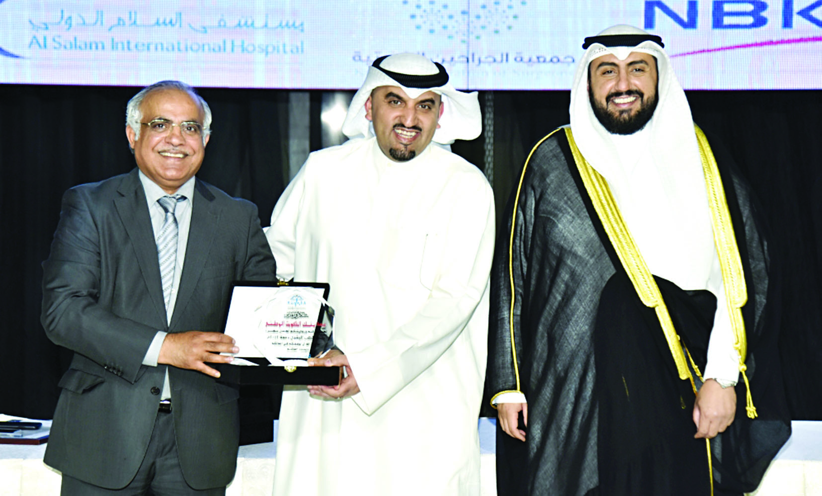 وزير الصحة وعميد الكلية يكرّمان «الوطني»