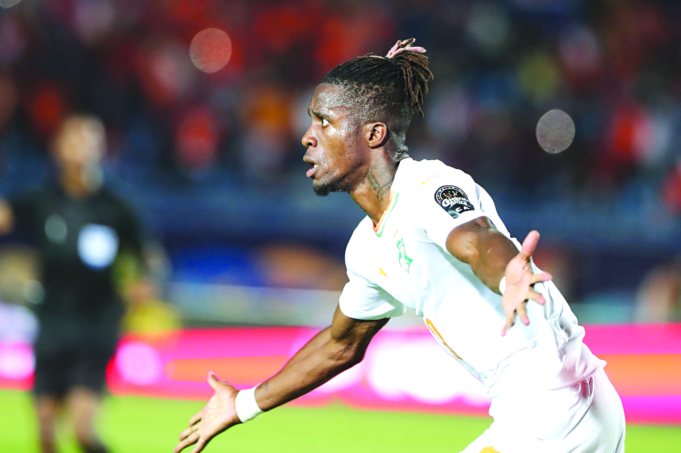 العاجي زاها محتفلاً بهدفه في مرمى مالي	(أ ف ب)