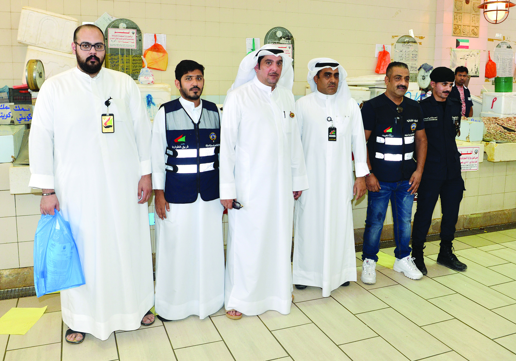 الانصاري متوسطا فريق التفتيش التجاري 