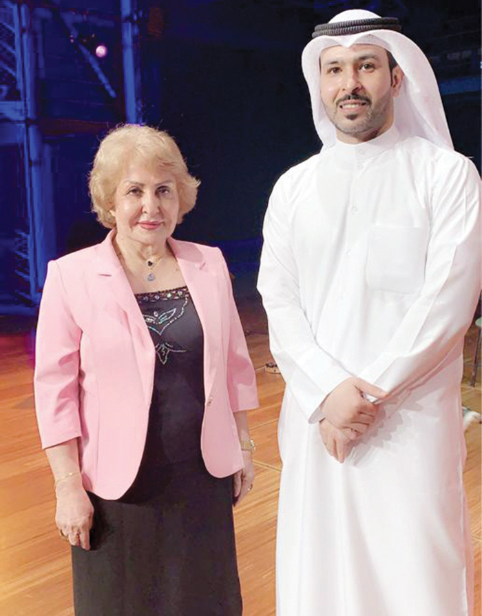 الزميل فيصل التركي مع أمل خضير 