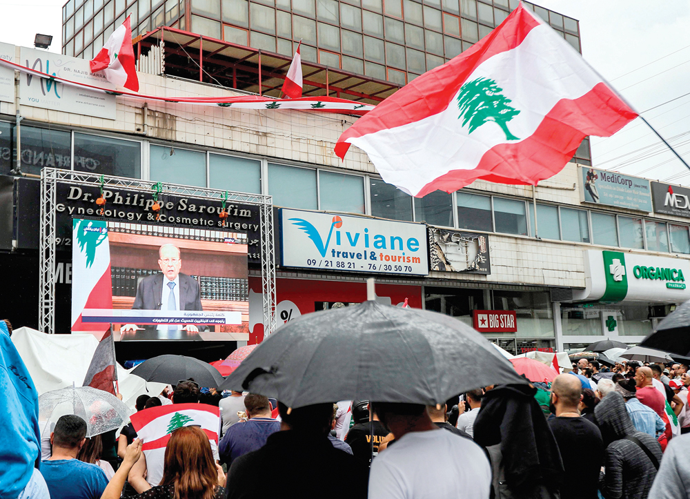  u0644u0628u0646u0627u0646u064au0648u0646 u064au0633u062au0645u0639u0648u0646 u0625u0644u0649 u062eu0637u0627u0628 u0639u0648u0646 u062au062du062a u0627u0644u0645u0637u0631 u0641u064a u0634u0645u0627u0644 u0628u064au0631u0648u062a u0623u0645u0633t (u0623 u0641 u0628)