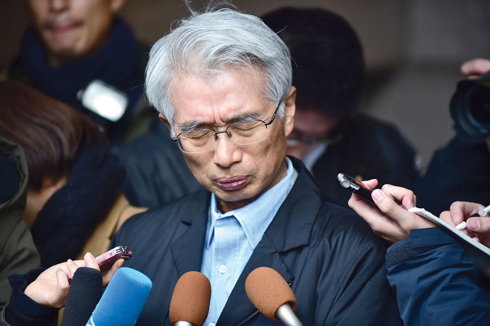 المحامي جونيشيرو هيروناكا	(ا ف ب)