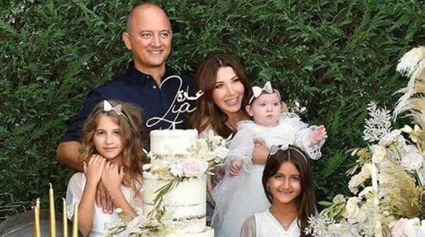 (u0646u0627u0646u0633u064a u0639u062cu0631u0645 u0648u0639u0627u0626u0644u062au0647u0627)