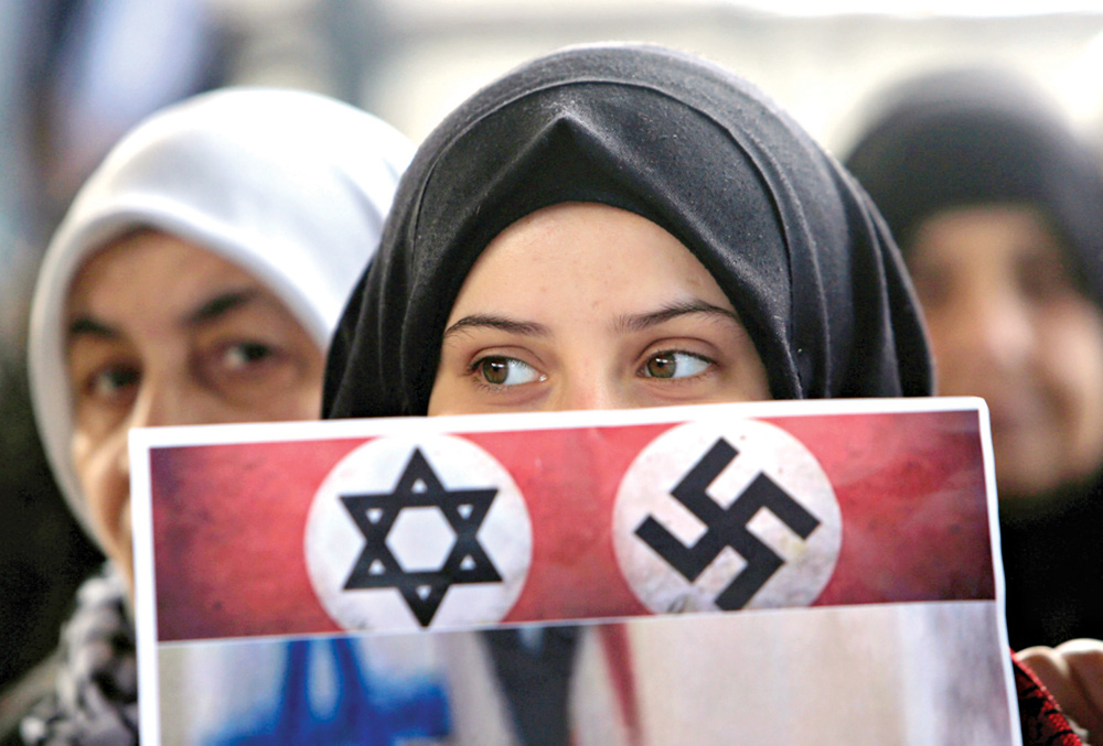 u0644u0627u062cu0626u0627u062a u0641u0644u0633u0637u064au0646u064au0627u062a u062eu0644u0627u0644 u0648u0642u0641u0629 u0627u062du062au062cu0627u062cu064au0629 u0639u0644u0649 u062eu0637u0629 u0627u0644u0633u0644u0627u0645 u0627u0644u0623u0645u064au0631u0643u064au0629 u0628u0645u062eu064au0645 u0639u064au0646 u0627u0644u062du0644u0648u0629 u0641u064a u062cu0646u0648u0628 u0644u0628u0646u0627u0646 u0623u0645u0633     t  (u0631u0648u064au062au0631u0632) 