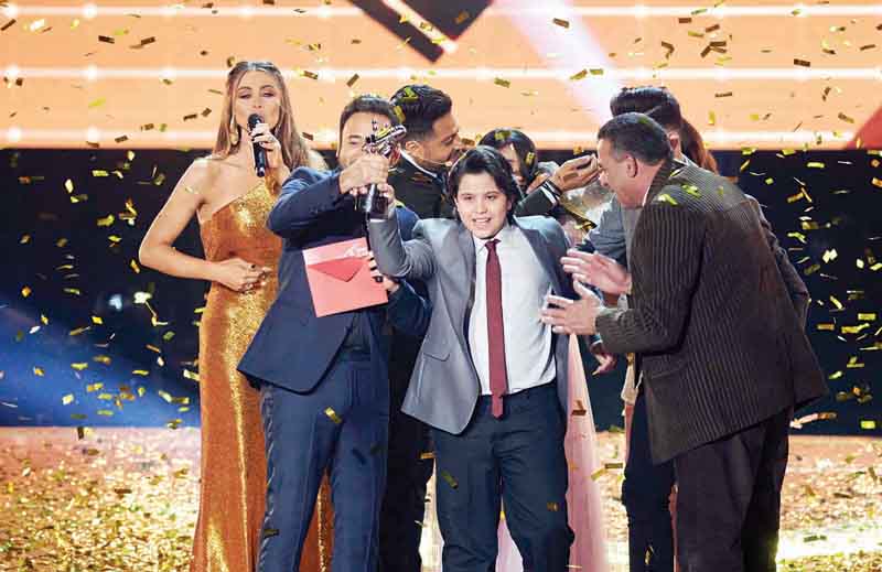 محمد إسلام رميح محتفلاً باللقب