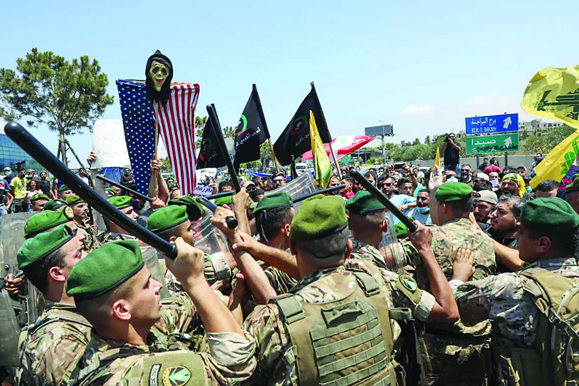 u062cu0646u0648u062f u0644u0628u0646u0627u0646u064au0648u0646 u064au0648u0627u062cu0647u0648u0646 u062au0638u0627u0647u0631u0629 u0644u0640 u00abu062du0632u0628 u0627u0644u0644u0647u00bb u0648u0627u0644u062du0632u0628 u0627u0644u0634u064au0648u0639u064a u0639u0646u062f u0645u062fu062eu0644 u0645u0637u0627u0631 u0628u064au0631u0648u062a u0627u0644u062fu0648u0644u064a u062au0646u062fu064au062fu0627u064b u0628u0632u064au0627u0631u0629 u0627u0644u062cu0646u0631u0627u0644 u0627u0644u0623u0645u064au0631u0643u064a u0645u0627u0643u0646u0632u064at      (u0623 u0641 u0628)