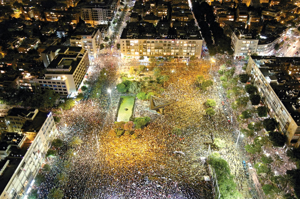 u062au0638u0627u0647u0631u0629 u0641u064a u062au0644 u0623u0628u064au0628 u0636u062f u0633u064au0627u0633u0629 u062du0643u0648u0645u0629 u0646u062au0646u064au0627u0647u0648 u0641u064a u0627u0644u062au0639u0627u0645u0644 u0645u0639 u062au062fu0627u0639u064au0627u062a u0643u0648u0631u0648u0646u0627 u0627u0644u0627u0642u062au0635u0627u062fu064au0629t (u0631u0648u064au062au0631u0632)