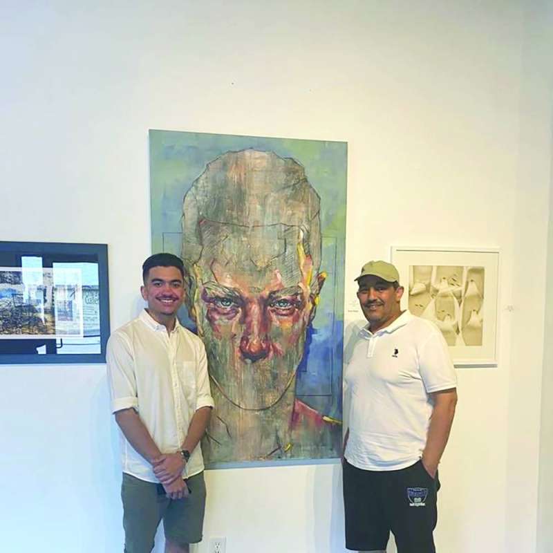 علي ووالده بدر علمدار
