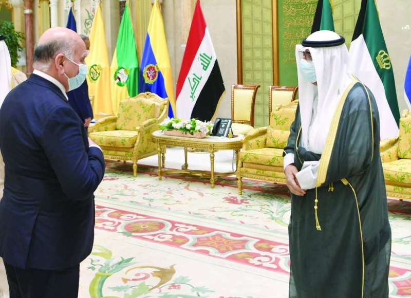 سمو ولي العهد ووزير الخارجية العراقي فؤاد حسين خلال زيارة الكاظمي في 22 أغسطس