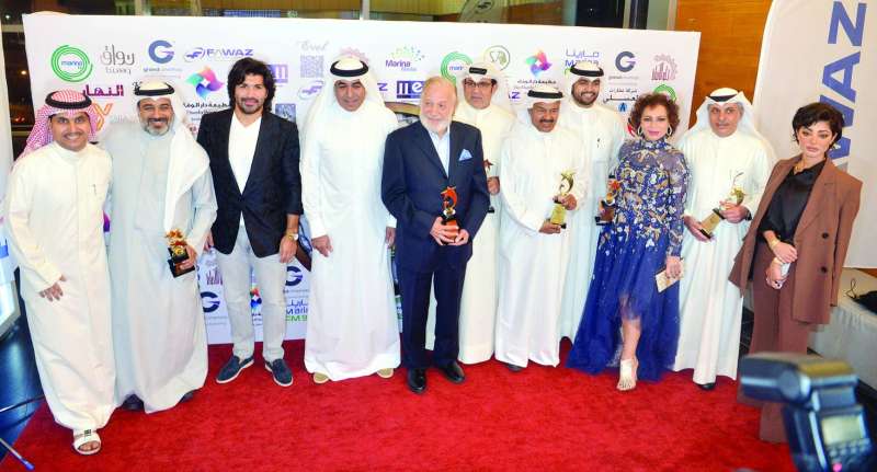 
المُكرّمون في لقطة جماعية 	(تصوير نايف العقله)
