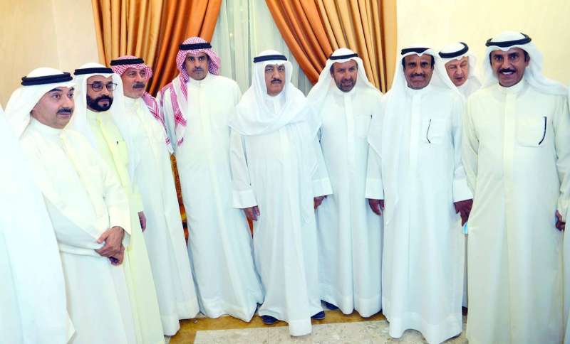 البراك والطاحوس يتوسطان المحتفين بهما 	 (تصوير نايف العقلة)
