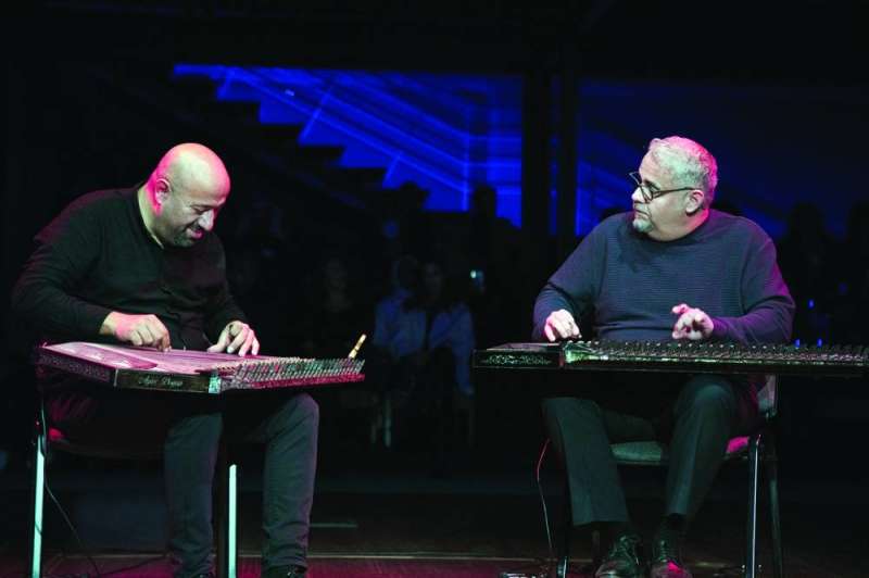 آيتاش دوغان مع بسام البلوشي خلال الأمسية الموسيقية
