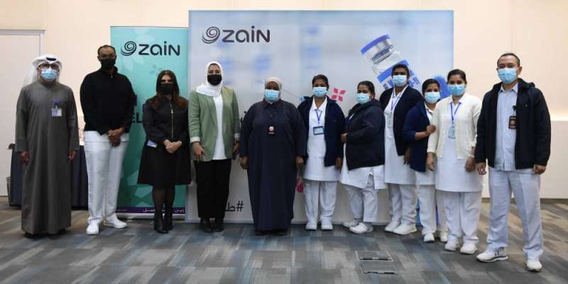 Zain officials with the nursing team from the Ministry of Health during the campaign 