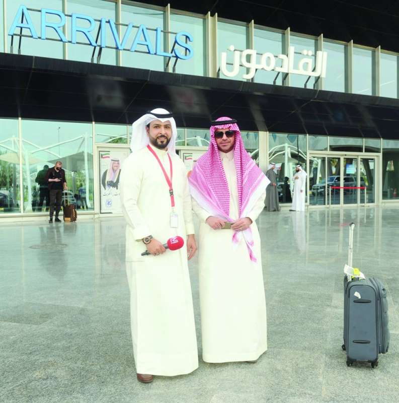 
العلياني مع الزميل فيصل التركي
