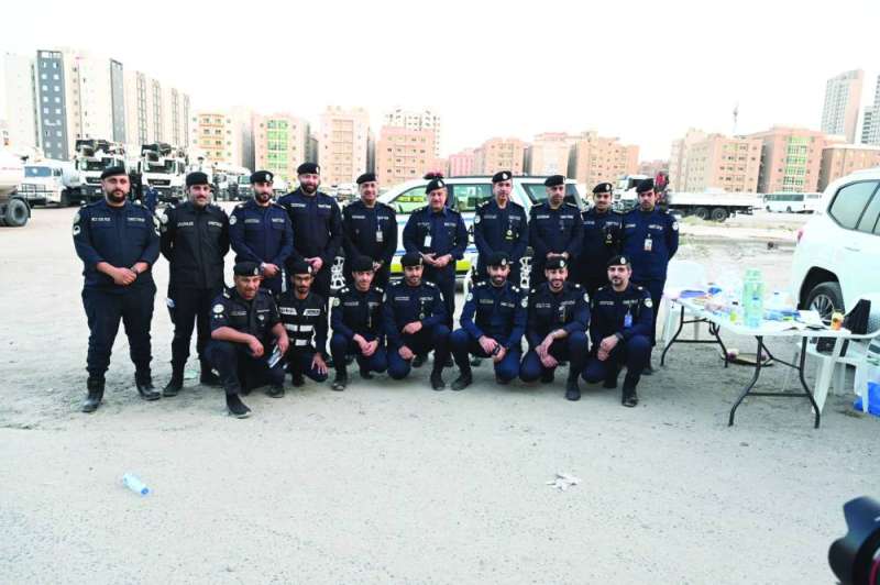  الصايغ والخالد ومحمود مع رجال الأمن المنفذين للحمة (تصوير نايف العقلة)