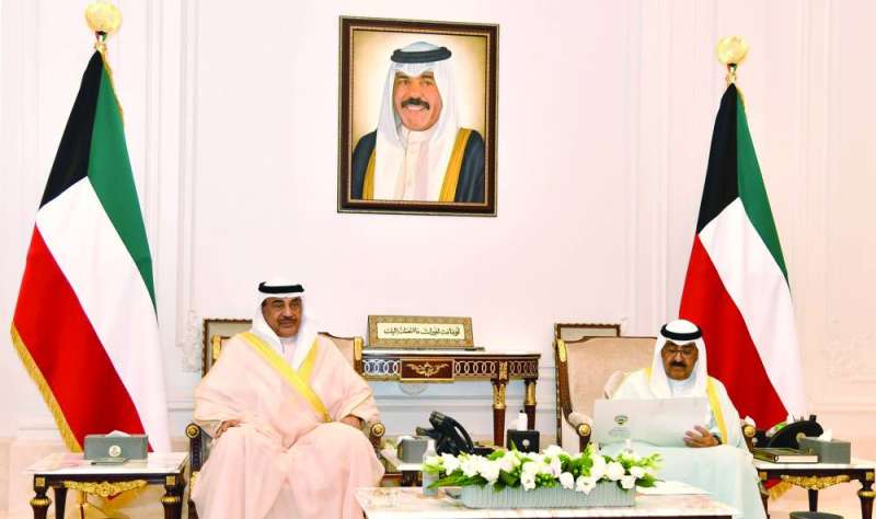 
سمو ولي العهد متسلماً كتاب استقالة الحكومة من صباح الخالد