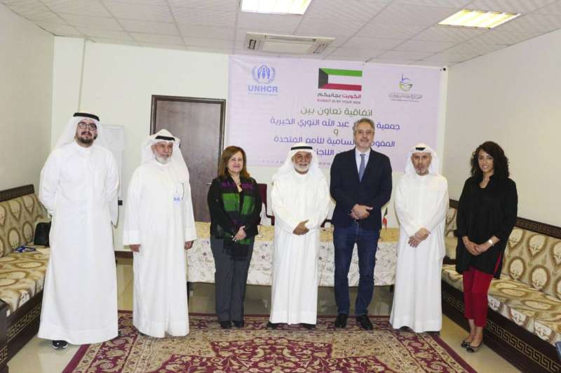 
صورة جماعية بعد توقيع الاتفاقية
