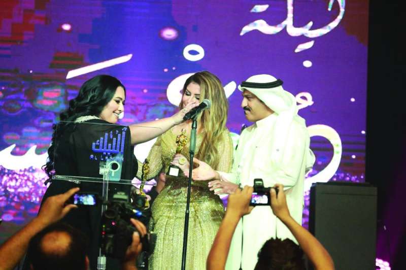 
... وخلال تكريمها مع بولند
