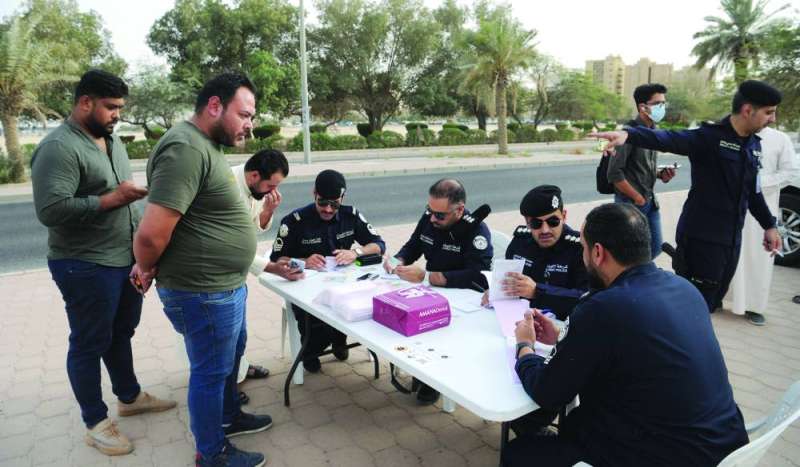 
جانب من تحرير المخالفات
