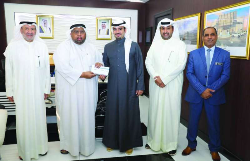 وفد تعاونية مشرف يسلم تبرعها السنوي لبيت الزكاة 