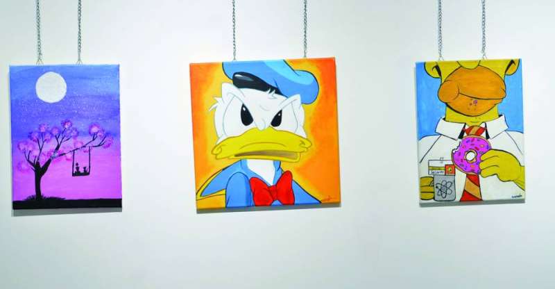 جانب من رسومات المعرض 