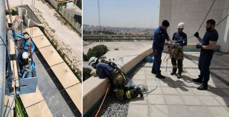 الإطفائيون خلال إنقاذ العمال