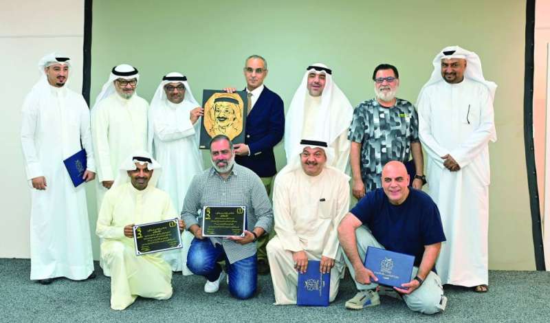 المُكرّمون في لقطة جماعية	 (تصوير أسعد عبدالله) 