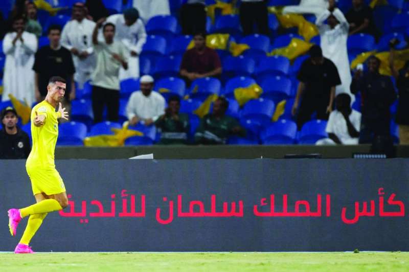 
رونالدو يحتفل بتسجيل هدف الفوز للنصر في مرمى الهلال	(أ ف ب)