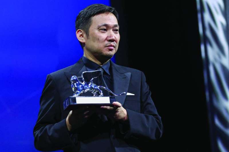 ريوسوكي هاماجوتشي مع جائزة «الأسد الفضي»