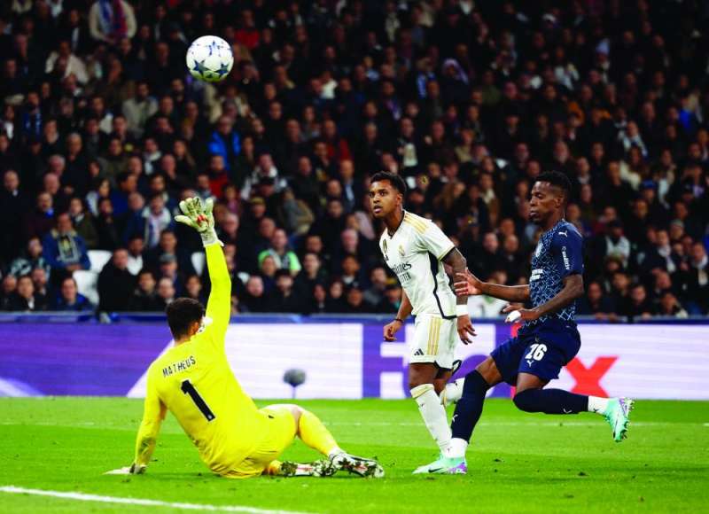 


رودريغو مسجلاً هدفه في مرمى سبورتينغ براغا 	(رويترز) 