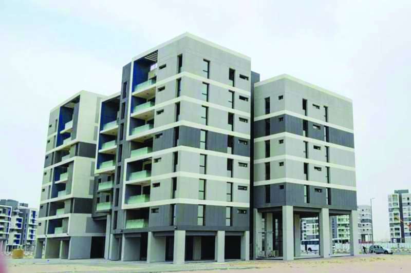 إحدى عمارات «صباح الأحمد السكنية»