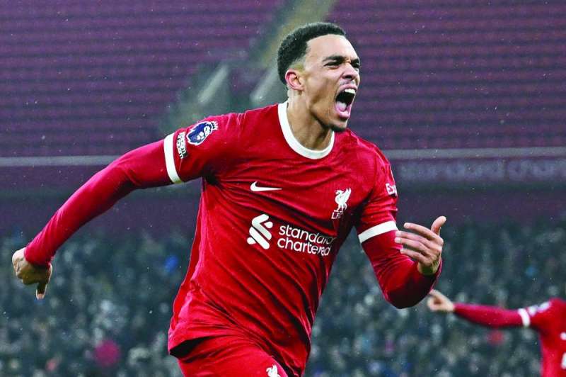 


ترينت ألكسندر- أرنولد محتفلاً بهدفه في مرمى فولهام	 (أ ف ب) 