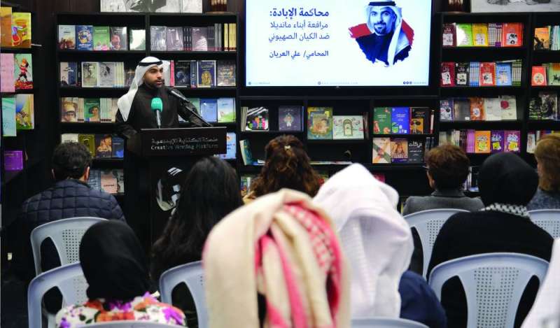 


المحامي العريان متحدثاً في المحاضرة	(تصوير نايف العقلة) 