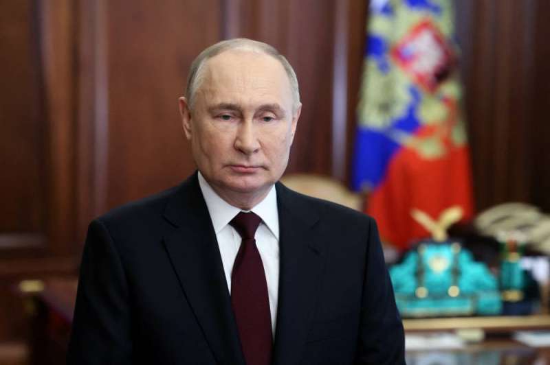 بوتين متحدثاً في خطاب متلفز عن الانتخابات الرئاسية المقبلة (رويترز)
