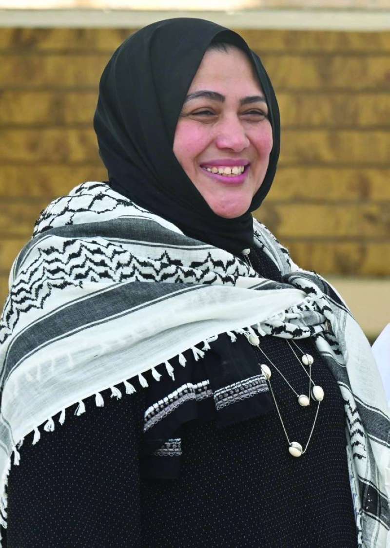 ابتسامة ثقة بالنصر 